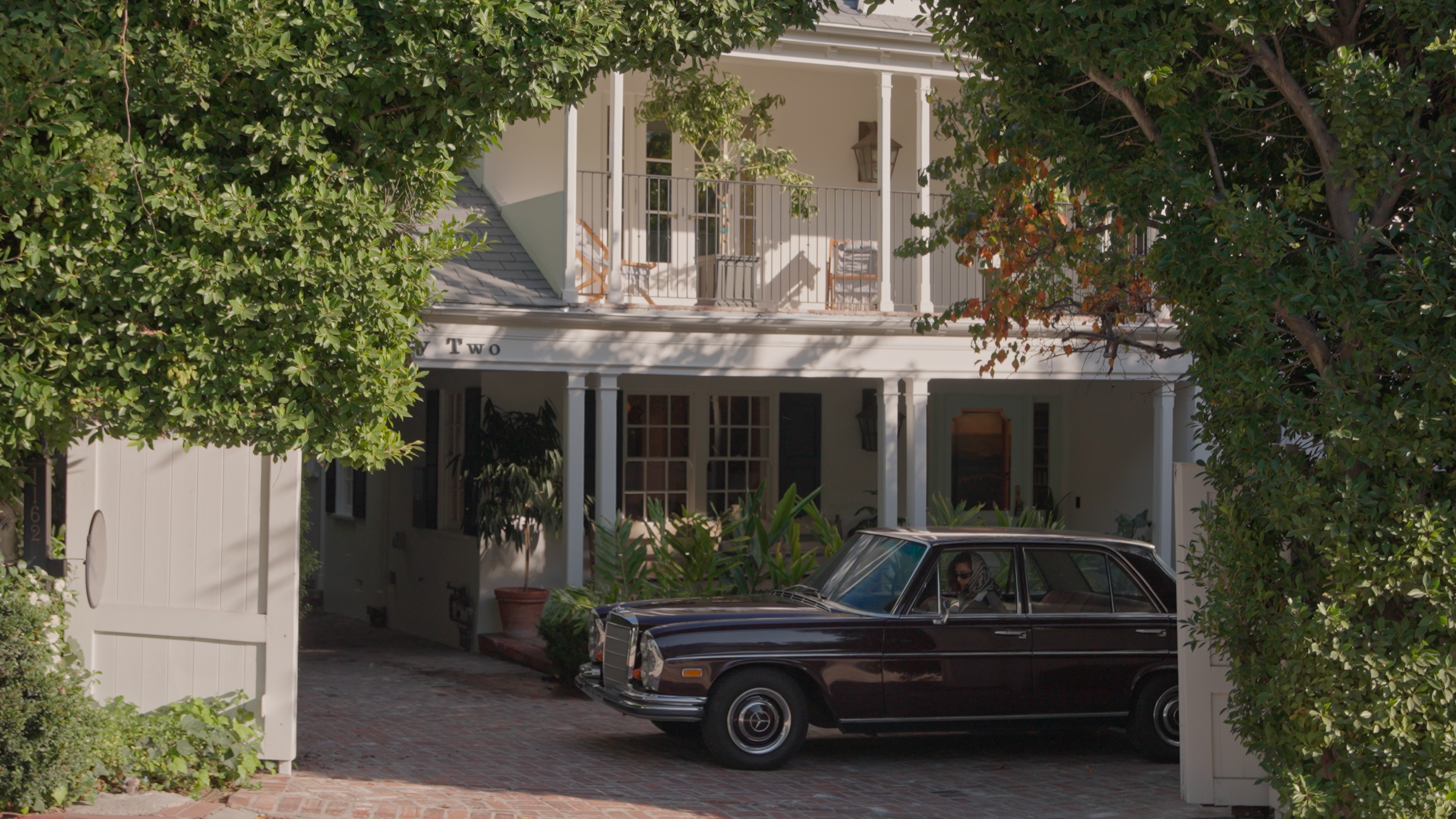 Exterior with vintage car, architectural film still